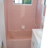 pink bathtub with pink tile before Cermacoat process